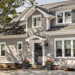 Sunlit Gray Shingle Garden Entryway