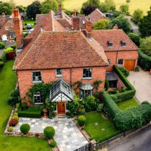 Charming Brick Manor with Vibrant Vines