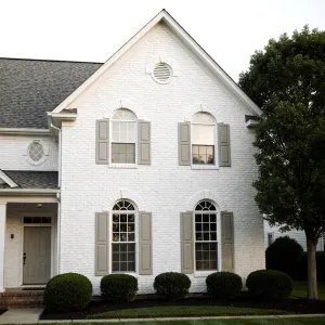 Elegant Brick Beauty with Shutters Galore