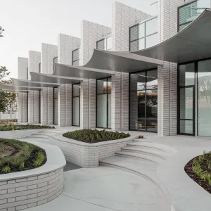 The Brick Ballet: A Curvature Commune