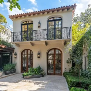 Sunlit Sanctuary with Wrought Iron Whimsy