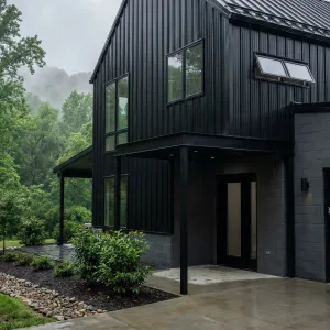 Rainwashed Ebony Hillside Barndominium
