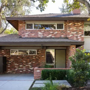 Midcentury Brick Canopy Family Nest