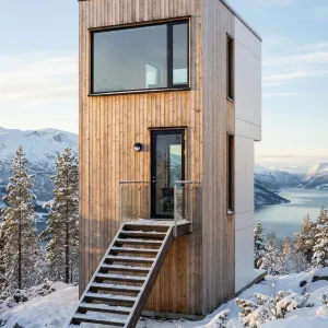 Vertical Pine Lookout Above Frozen Fjord