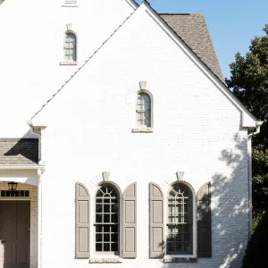 Serene White Sanctuary With Character Windows