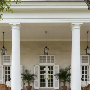 Colonial Porch Perfection Under Tropical Canopy