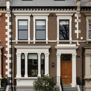 Victorian Whirlwind: A Brick and Window Waltz